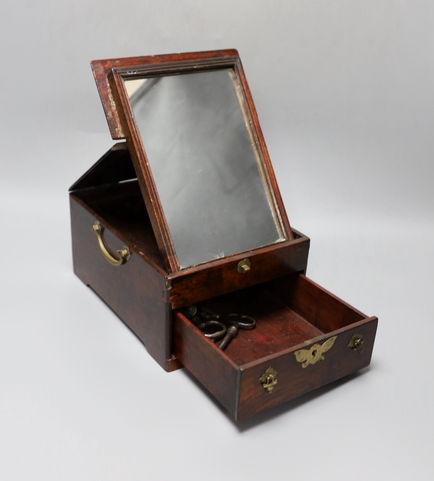 A Chinese brass mounted two handled hardwood dressing table box. L24 x W18 x H12cm